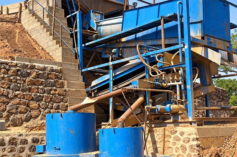 Centrifugal concentrator and alluvial trommel screen 